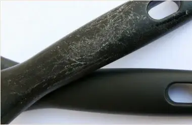 Worn plastic pan handle